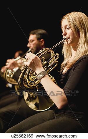 French horn players in orchestra View Large Photo Image Stock Photo - French horn players in orchestra. Fotosearch
