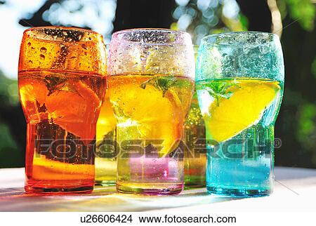 Picture - Fruity drinks in colorful glasses. Fotosearch