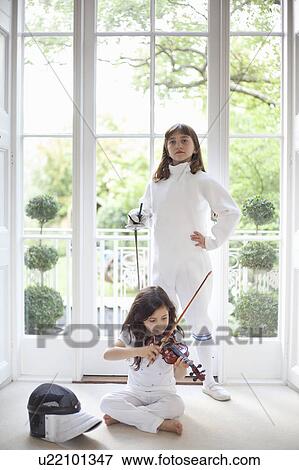 Girls with violin and fencing gear View Large Photo Image Stock Photo - Girls with violin and fencing gear. Fotosearch