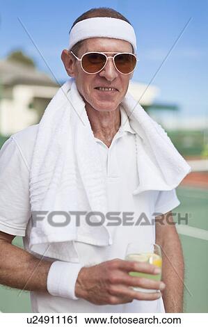 Older man drinking lemonade outdoors View Large Photo Image Stock Image - Older man drinking lemonade outdoors. Fotosearch