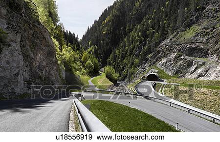 Stock Photo - Roads through mountains. Fotosearch