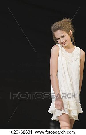 Smiling girl wearing dress View Large Photo Image Stock Image - Smiling girl wearing dress. Fotosearch