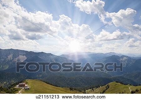 Sun rising over rural mountains View Large Photo Image Stock Image - Sun rising over rural mountains. Fotosearch