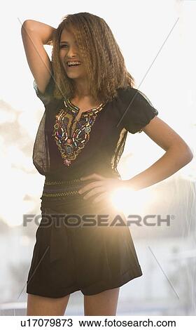 Teenage girl smiling outdoors View Large Photo Image Stock Image - Teenage girl smiling outdoors. Fotosearch