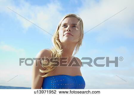 Teenage girl standing outdoors View Large Photo Image Stock Image - Teenage girl standing outdoors. Fotosearch