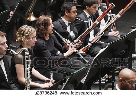 Winds section in orchestra View Large Photo Image Stock Photo - Winds section in orchestra. Fotosearch