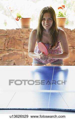 Woman playing table tennis View Large Photo Image Stock Photo - Woman playing table tennis. Fotosearch