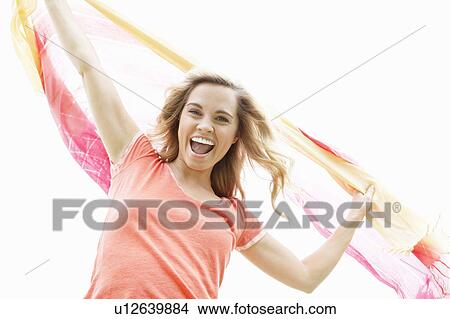 Woman playing with shawl outdoors View Large Photo Image Picture - Woman playing with shawl outdoors. Fotosearch