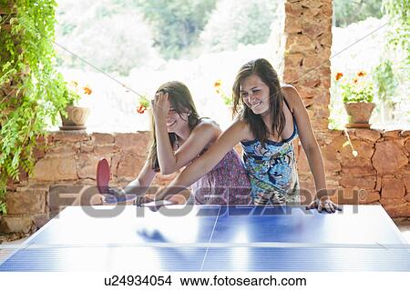 Picture - Women playing table tennis. Fotosearch