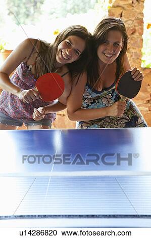 Women playing table tennis View Large Photo Image Stock Image - Women playing table tennis. Fotosearch