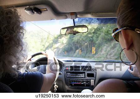 Women riding in car View Large Photo Image Stock Image - Women riding in car. Fotosearch