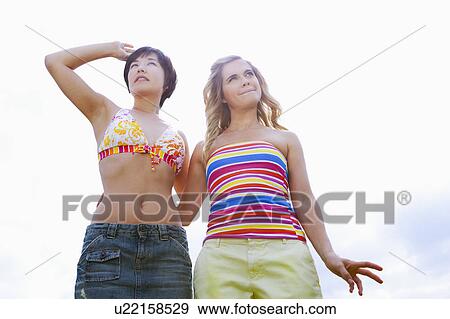 Women standing together outdoors View Large Photo Image Stock Photo - Women standing together outdoors. Fotosearch