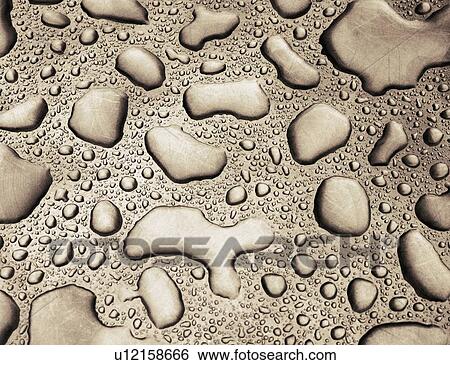 Stock Photograph - Rain Water On Metal Sheet. Fotosearch
