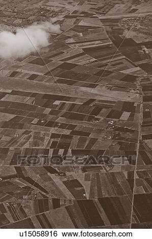 Monochrome aerial view of cultivated farmland, creating patchwork of rectangles and patterns, Kenya, East Africa View Large Photo Image Stock Photograph - Monochrome aerial view of cultivated farmland, creating patchwork of rectangles and patterns, Kenya, East Africa. Fotosearch