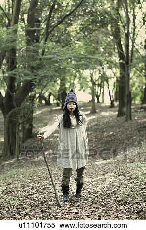 A young woman in the forest View Large Photo Image Stock Photography - A young woman in the forest. Fotosearch
