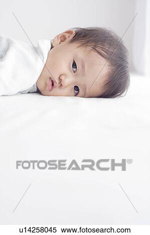 Baby Boy Lying on Front View Large Photo Image Stock Photography - Baby Boy Lying on Front. Fotosearch