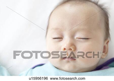 Stock Photograph - Baby Girl Sleeping. Fotosearch