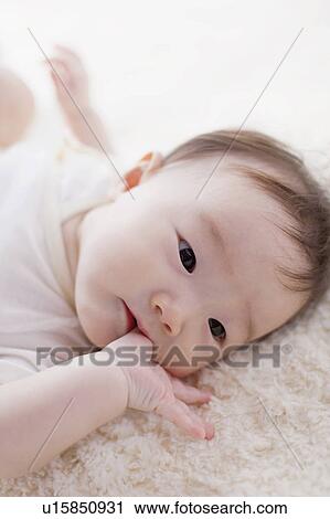 Baby sucking finger View Large Photo Image Stock Image - Baby sucking finger. Fotosearch