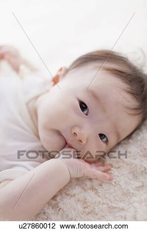 Baby sucking finger View Large Photo Image Stock Image - Baby sucking finger. Fotosearch