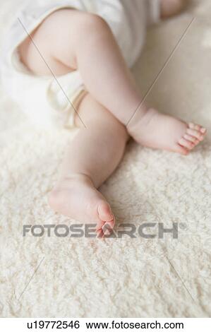 Baby's legs View Large Photo Image Stock Photograph - Baby's legs. Fotosearch