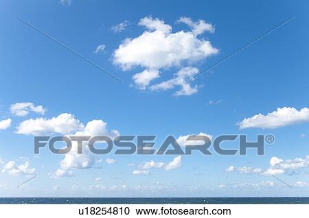 Stock Image - Blue Sky Over Sea. Fotosearch