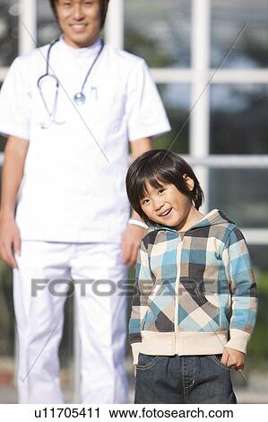 Boy and Male Doctor View Large Photo Image Stock Image - Boy and Male Doctor. Fotosearch