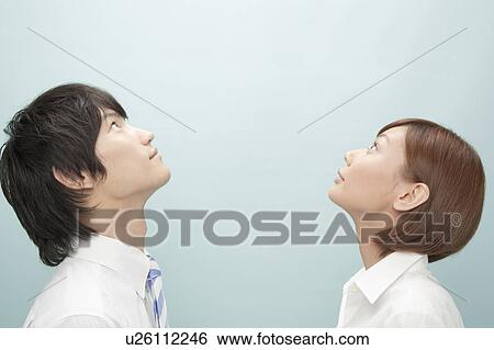 Businessman and Businesswoman Looking Up View Large Photo Image Stock Photograph - Businessman and Businesswoman Looking Up. Fotosearch