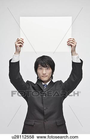 Businessman Holding Blank Message View Large Photo Image Stock Photo - Businessman Holding Blank Message. Fotosearch
