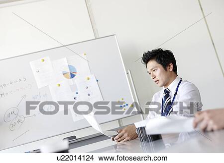 Businessman in Meeting View Large Photo Image Picture - Businessman in Meeting. Fotosearch