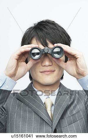 Businessman Looking Through Binoculars View Large Photo Image Stock Image - Businessman Looking Through Binoculars. Fotosearch