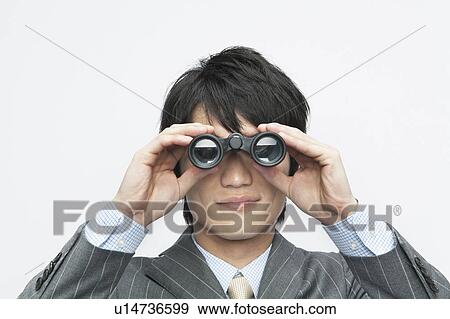 Businessman Looking Through Binoculars View Large Photo Image Stock Photo - Businessman Looking Through Binoculars. Fotosearch