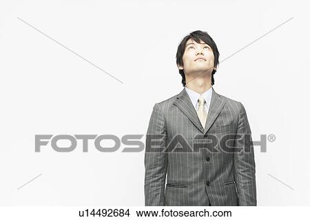 Picture - Businessman Looking Up. Fotosearch