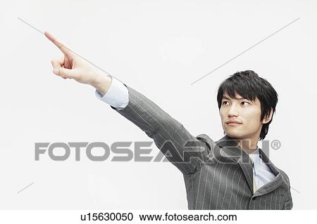 Stock Image - Businessman Pointing Up. Fotosearch
