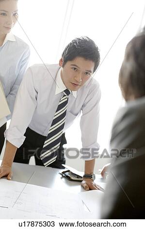 Businessman Talking in Meeting View Large Photo Image Stock Image - Businessman Talking in Meeting. Fotosearch
