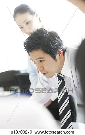 Stock Photo - Businessman Talking in Meeting. Fotosearch