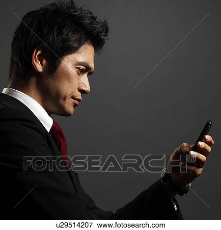 Businessman Text Messaging View Large Photo Image Stock Photo - Businessman Text Messaging. Fotosearch