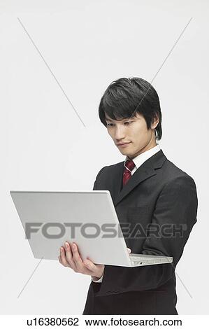 Businessman Using Laptop View Large Photo Image Stock Image - Businessman Using Laptop. Fotosearch
