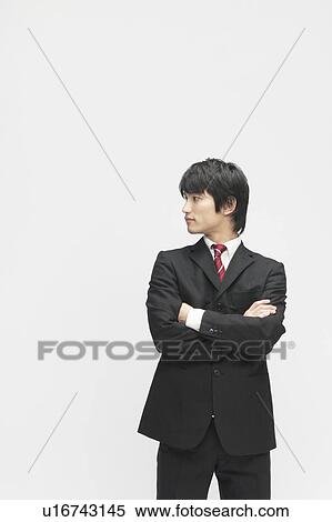 Stock Photography - Businessman with Arms Crossed. Fotosearch