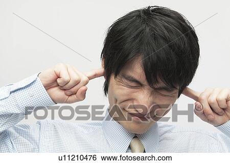 Businessman with Fingers in Ears View Large Photo Image Stock Photograph - Businessman with Fingers in Ears. Fotosearch