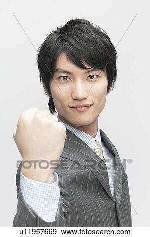 Businessman with Fist Up View Large Photo Image Stock Photo - Businessman with Fist Up. Fotosearch