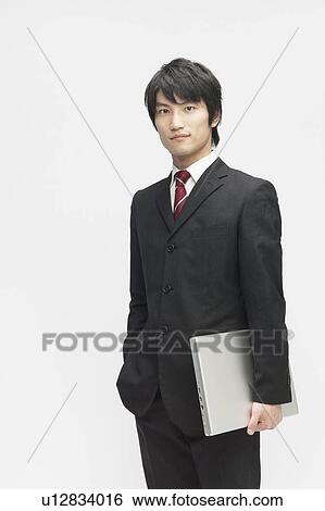 Businessman with Laptop View Large Photo Image Stock Photograph - Businessman with Laptop. Fotosearch