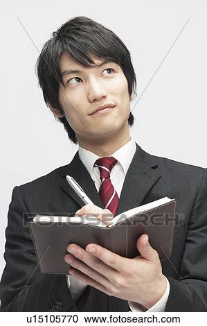 Businessman Writing to Notebook View Large Photo Image Stock Image - Businessman Writing to Notebook. Fotosearch