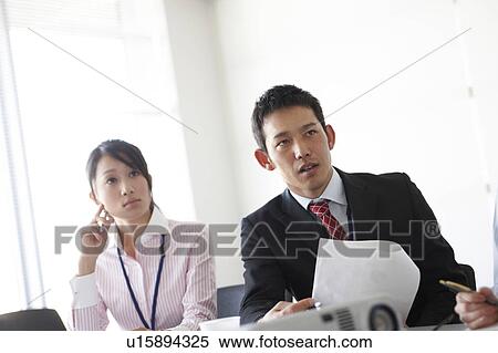 Businesswoman and Businessman in Meeting View Large Photo Image Stock Photography - Businesswoman and Businessman in Meeting. Fotosearch