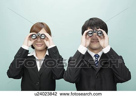 Businesswoman and Businessman Looking Through Binoculars View Large Photo Image Stock Image - Businesswoman and Businessman Looking Through Binoculars. Fotosearch