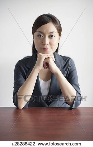 Businesswoman at Desk View Large Photo Image Stock Image - Businesswoman at Desk. Fotosearch