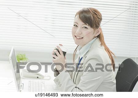 Businesswoman Having Coffee Break View Large Photo Image Stock Image - Businesswoman Having Coffee Break. Fotosearch
