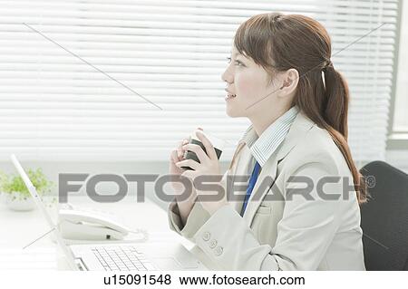Businesswoman Having Coffee Break View Large Photo Image Stock Photo - Businesswoman Having Coffee Break. Fotosearch