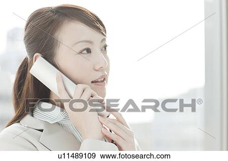 Stock Photo - Businesswoman on Mobile Phone. Fotosearch