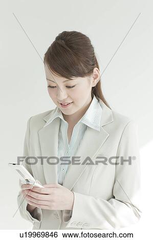 Stock Photograph - Businesswoman On Phone. Fotosearch