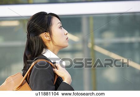 Picture - Businesswoman Running. Fotosearch